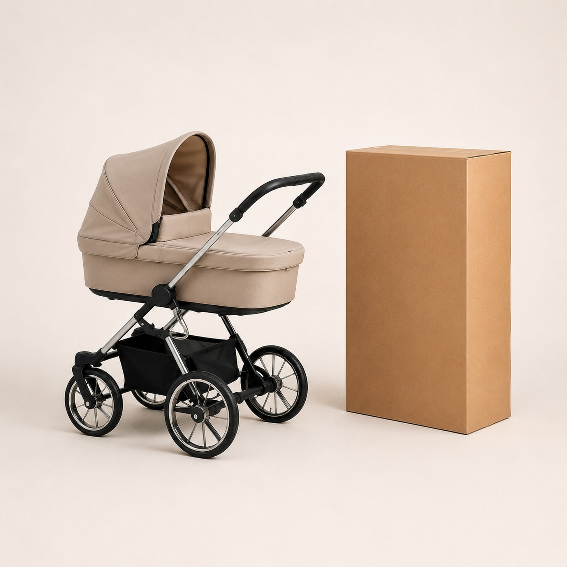 Pram shown beside a large cardboard shipping box for safe moving, storage and courier delivery